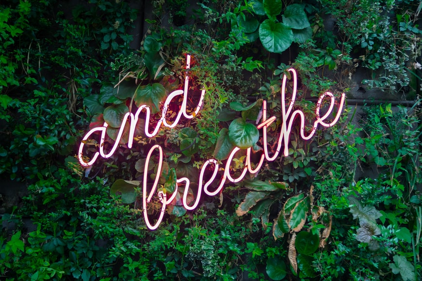 and breathe neon text